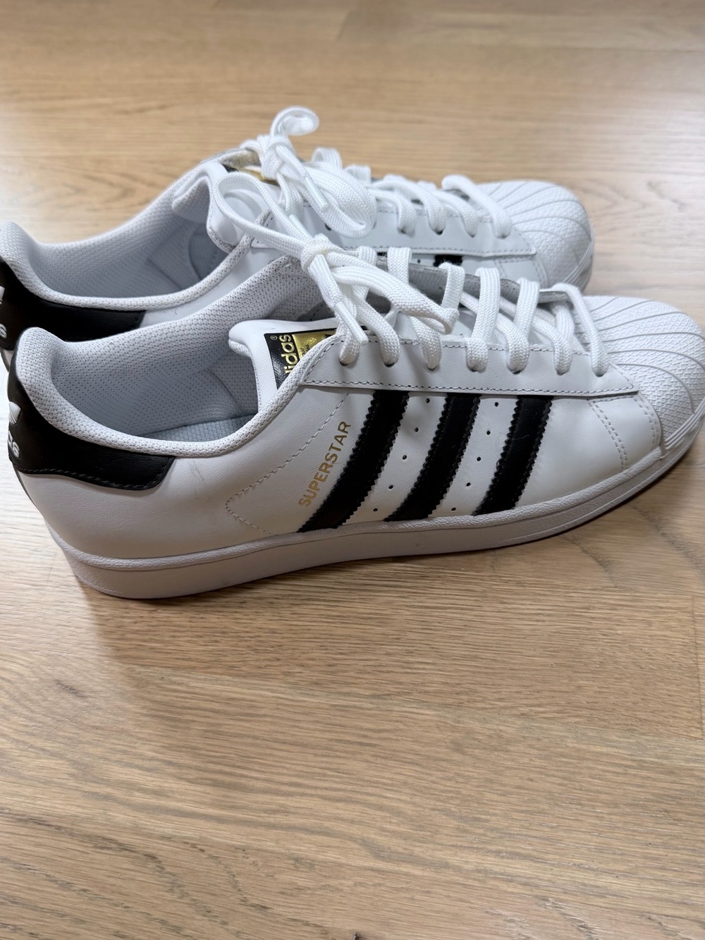 adidas White and Black Superstar Women’s Sneakers